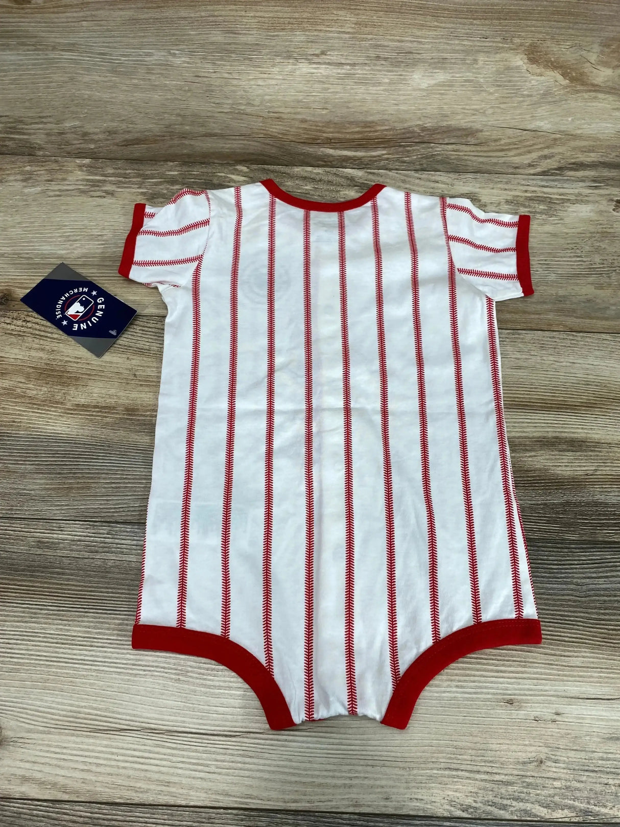 Front view of white Washington Nationals baby creeper, size 24M, showing red team logo on chest on white background