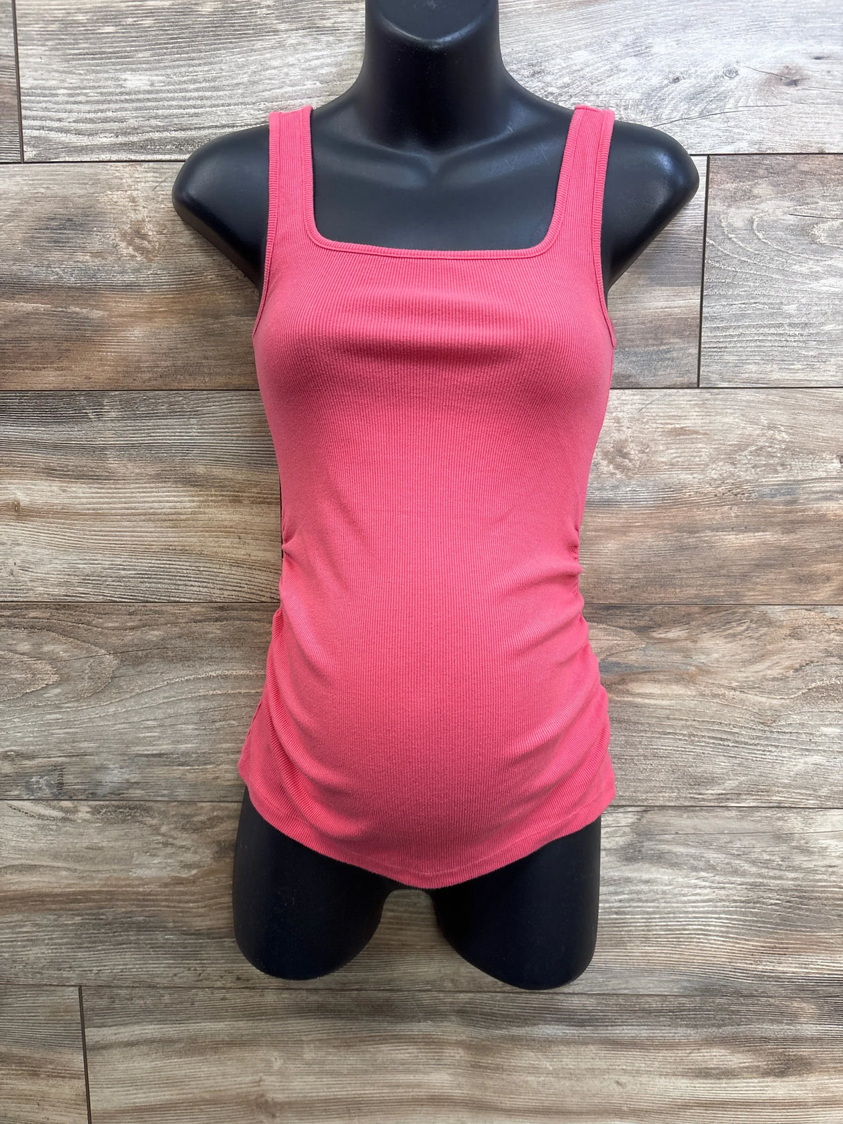 Front view of Old Navy maternity ribbed tank top in hot pink with square neckline and side ruching on mannequin