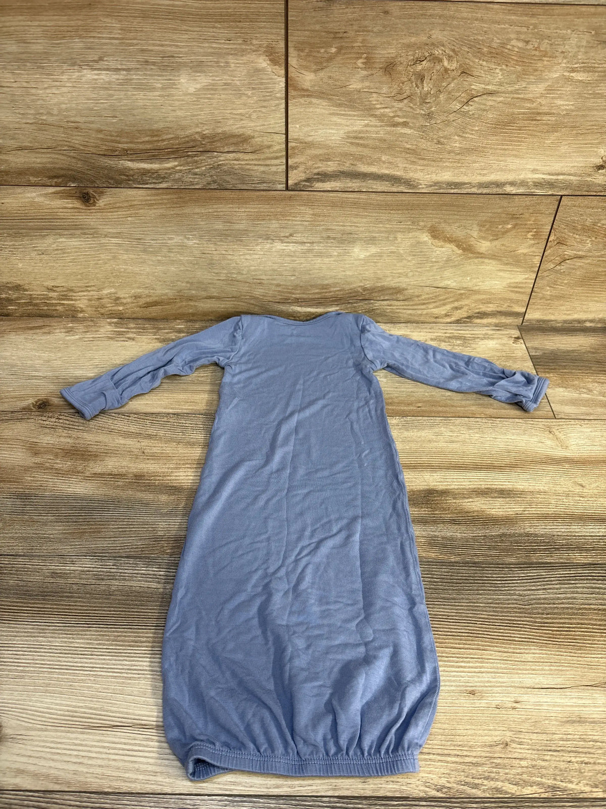 Front view of blue Just One You ComfySoft sleep gown, size 3 months, with long sleeves and gathered hem on wood flooring