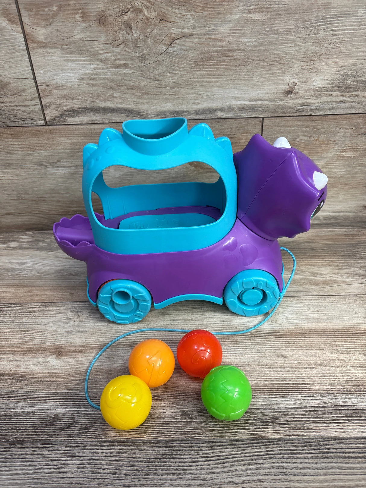 Fisher Price Poppin’ Triceratops Dinosaur Learning Toy w/ 4 Balls