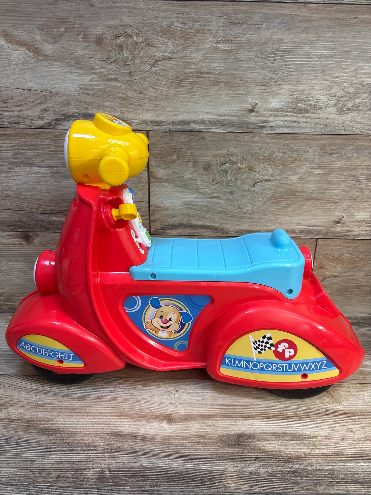 Fisher Price Laugh & Learn Smart Stages Scooter