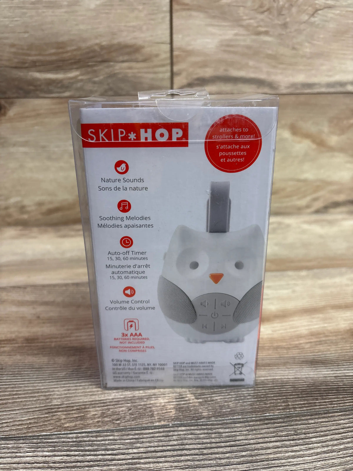 Back of Skip Hop Stroll and Go owl soother package showing nature sounds, melodies, auto off timer, and volume control