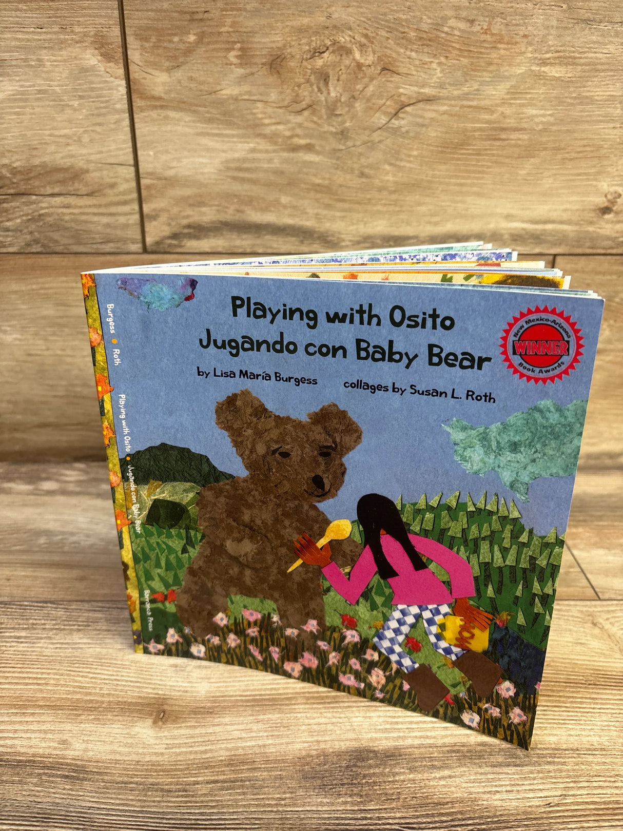 Playing with Osito Jugando con Baby Bear Bilingual Paperback Book