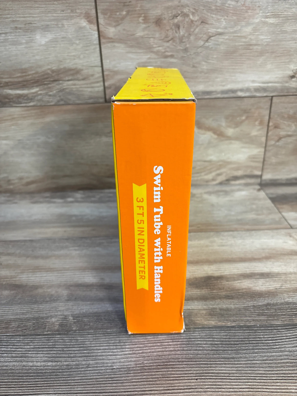 Inflatable swim tube with handles in box, 3 ft 5 in diameter, kids pool float packaging