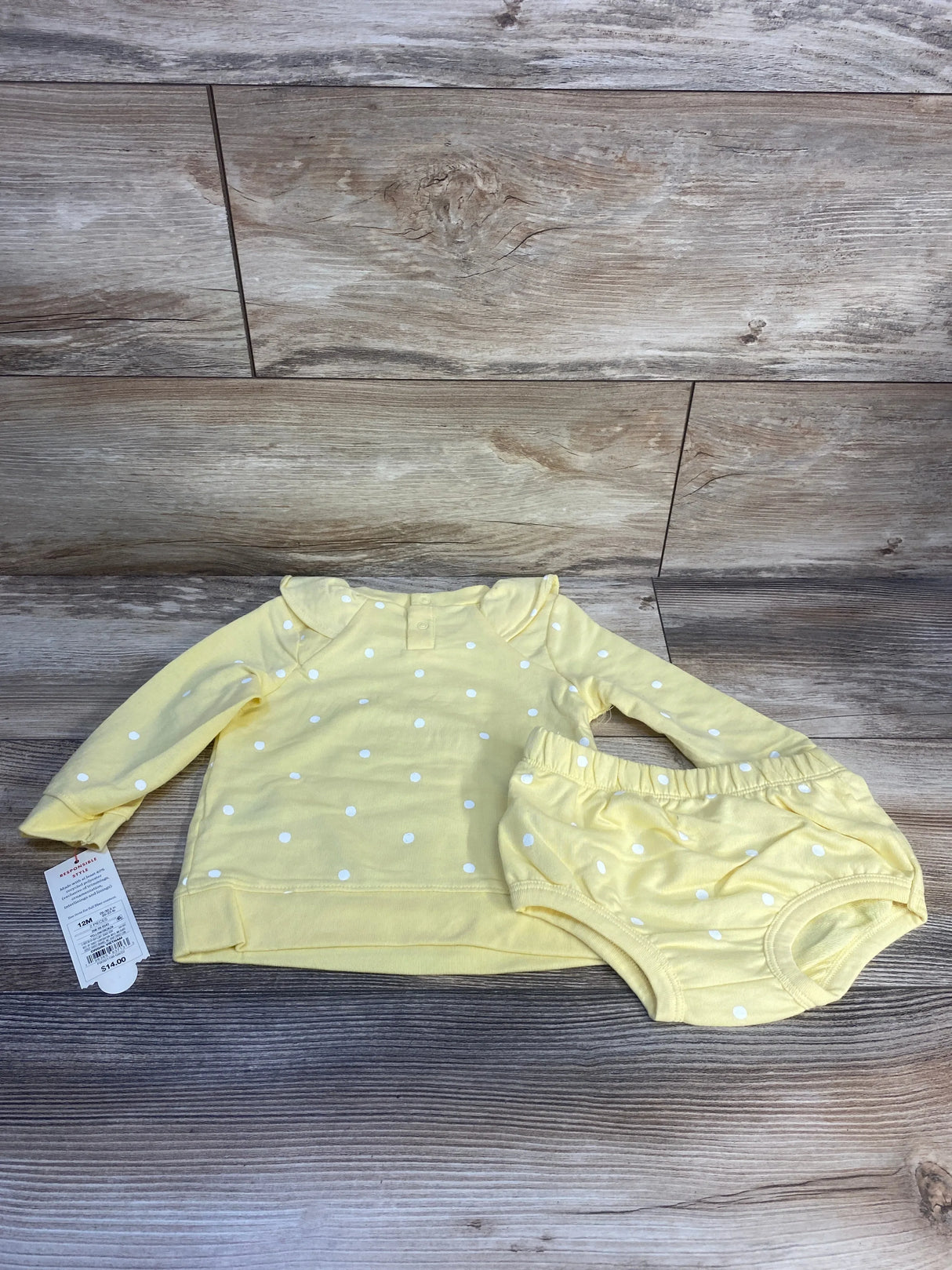 Yellow baby outfit set with white polka dots, long sleeve top and matching diaper cover