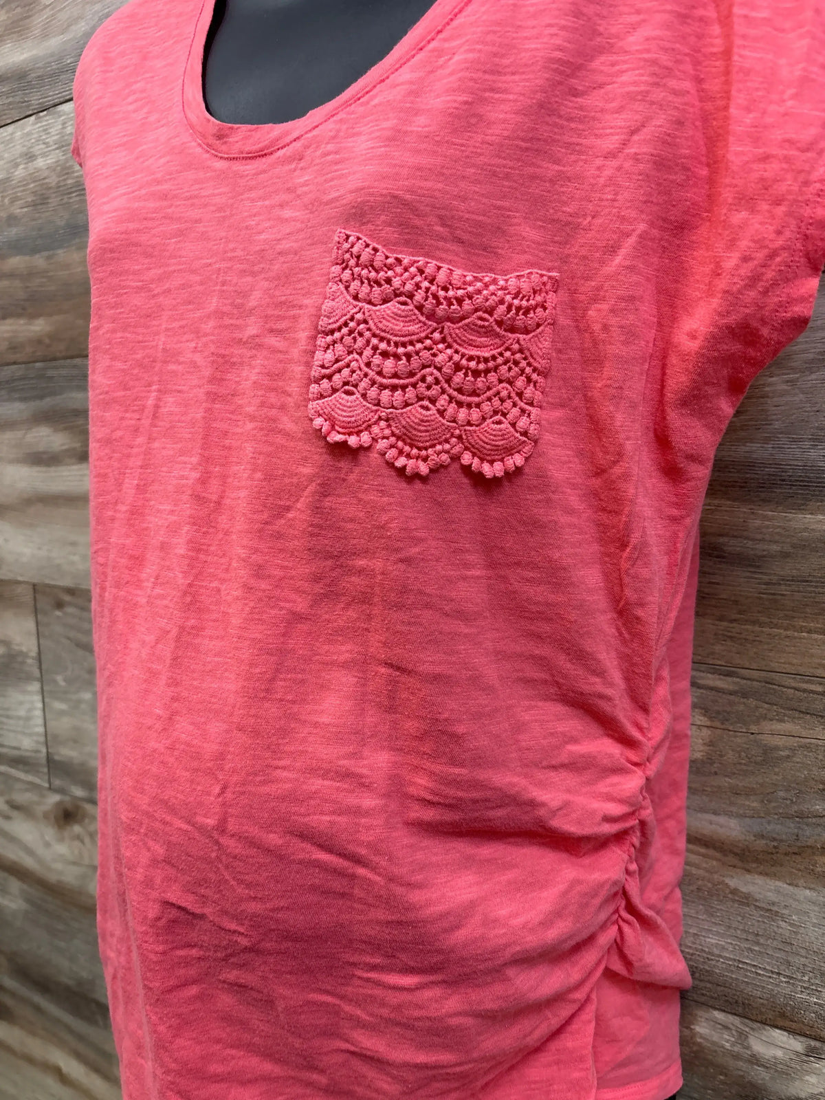 Pink Motherhood Maternity shirt with a decorative lace pocket