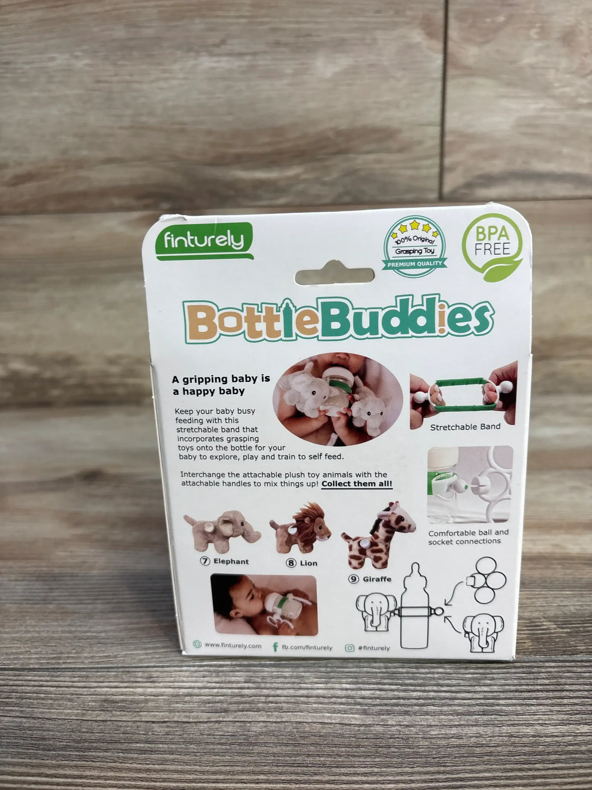 Back view of Bottle Buddies Elephant Plush Starter Kit box showing stretchable band, elephant attachment, and BPA free badge