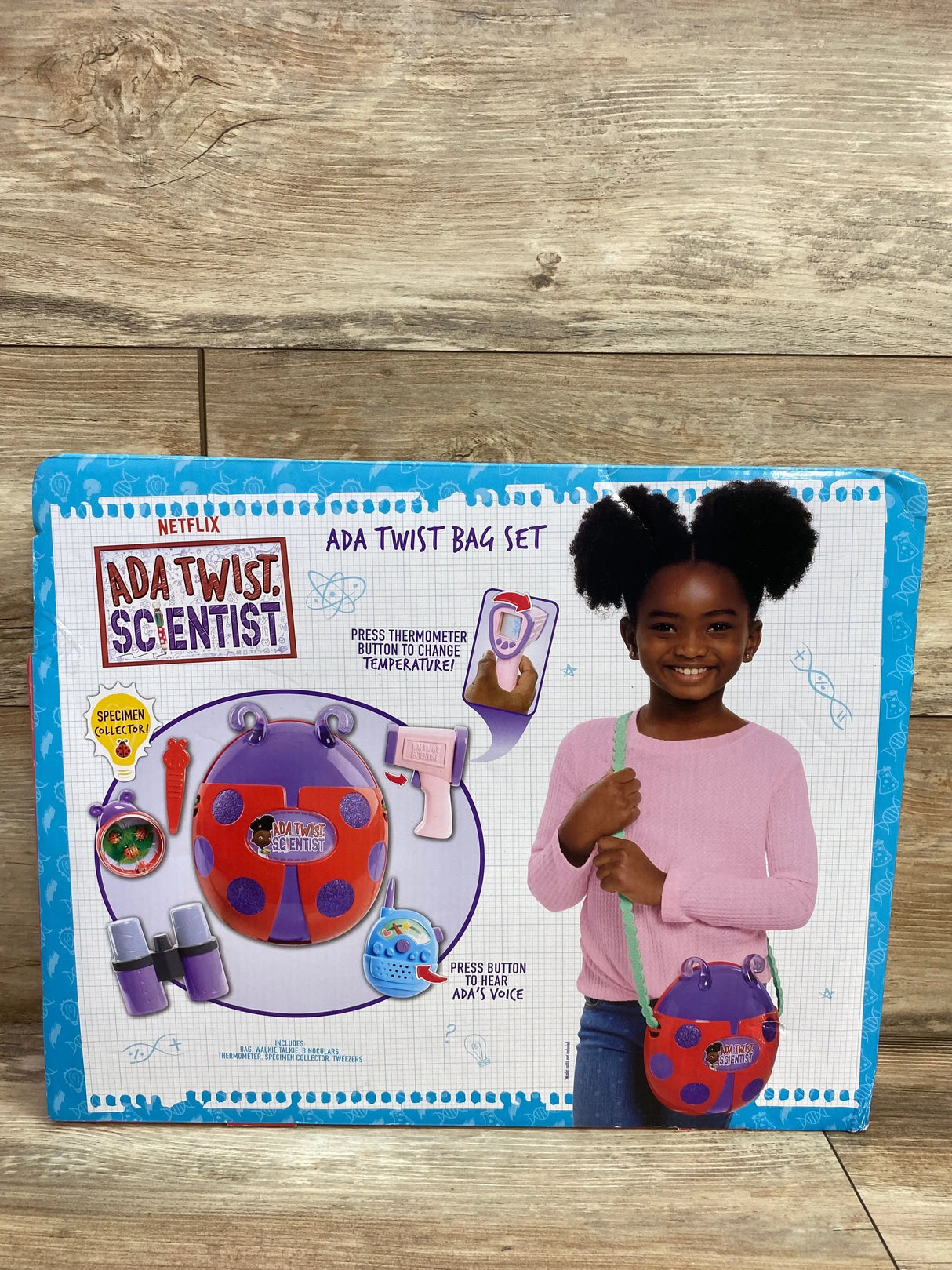 Front view of Ada Twist Bag Set showing ladybug bag with binoculars, thermometer, specimen collector, and voice walkie-talkie