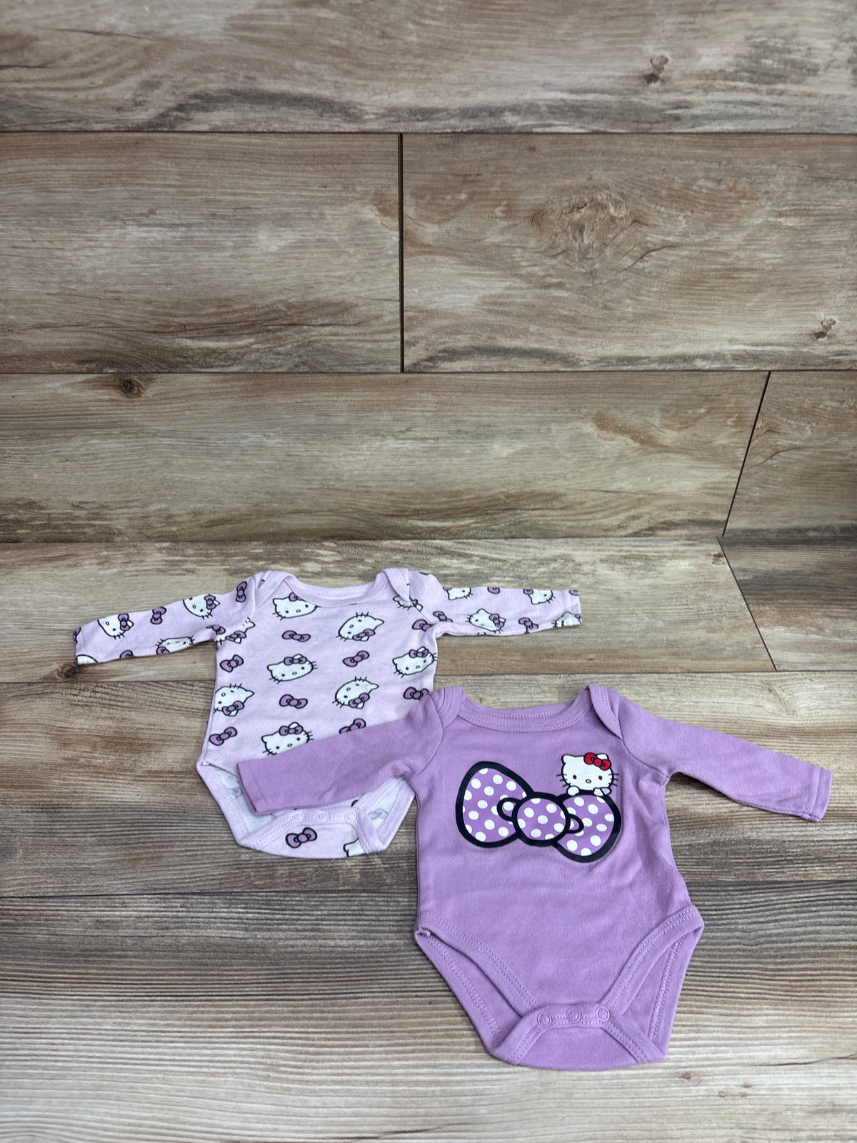 Hello Kitty 2pk Bodysuits Purple sz Newborn