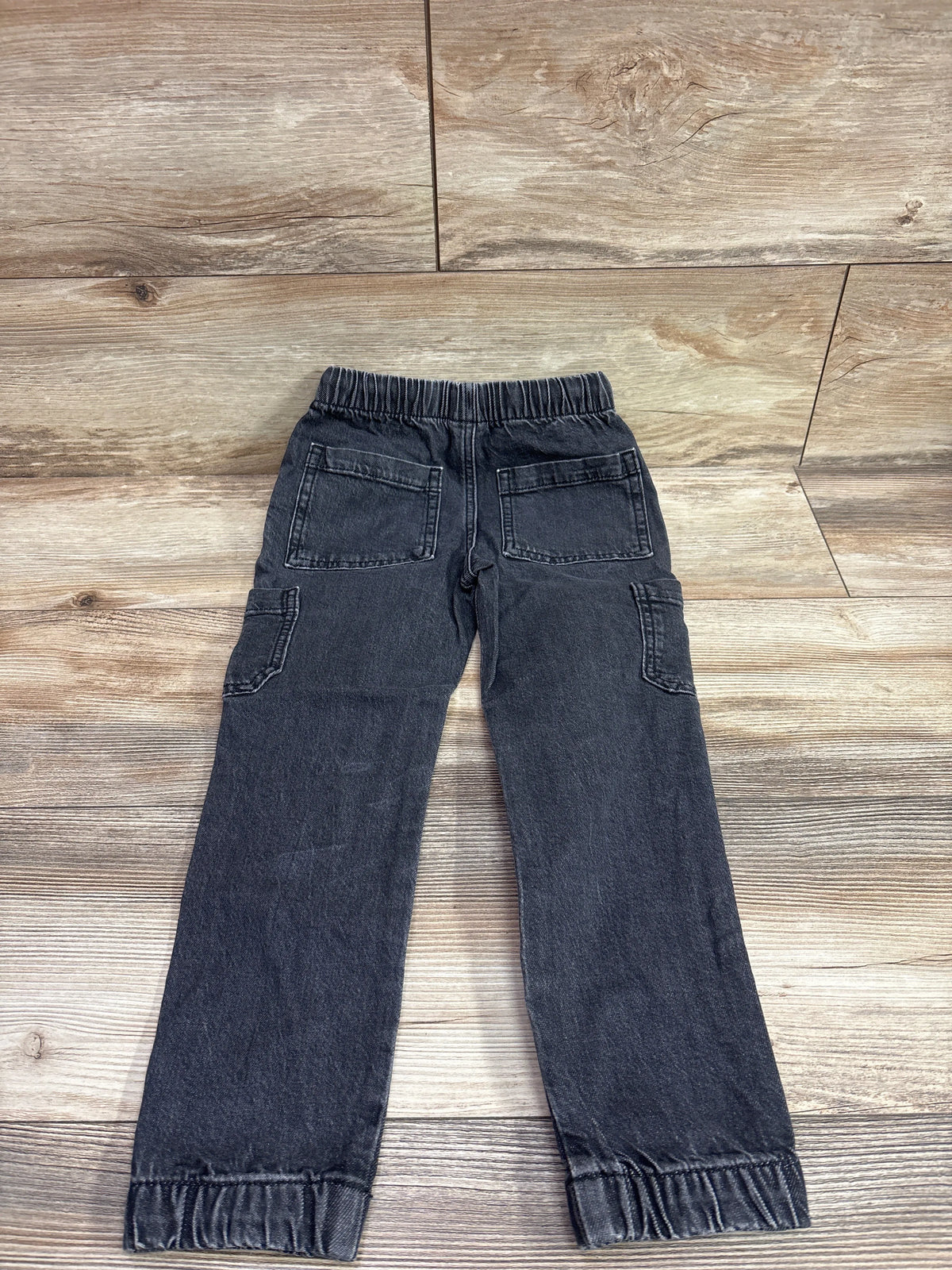Back view of Cat and Jack black denim joggers, size 5T, with drawstring, rear and cargo pockets, and elastic cuffs