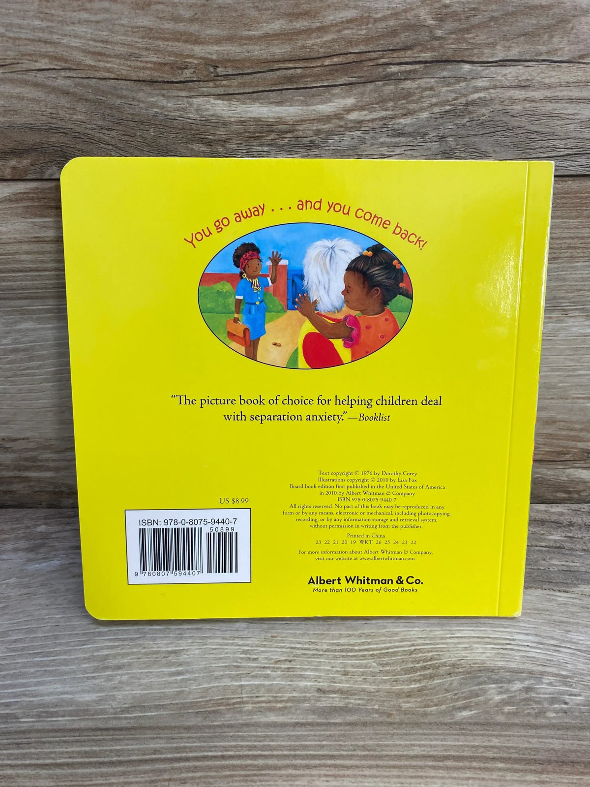 Back of You Go Away board book with yellow cover, headline You go away and you come back, oval illustration of kids, barcode
