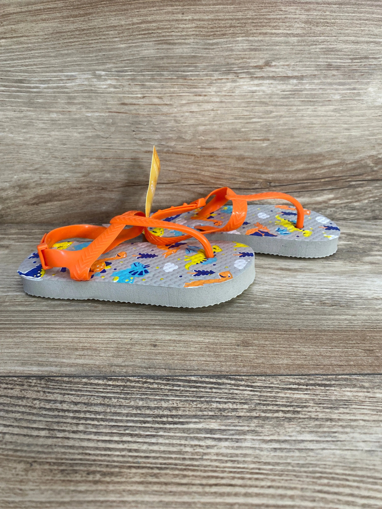 NEW Juncture Flip Flops Dinos, Orange sz 7/8c - Me n Mommy To Be