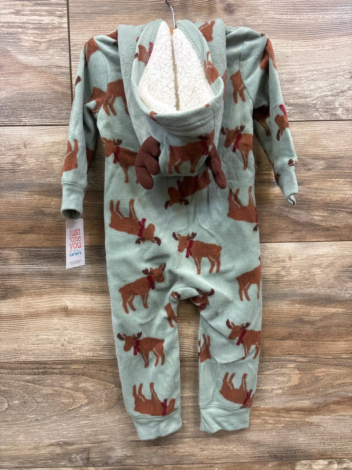 Soft fleece baby onesie with moose print, hooded, cozy winter sleepwear for infants