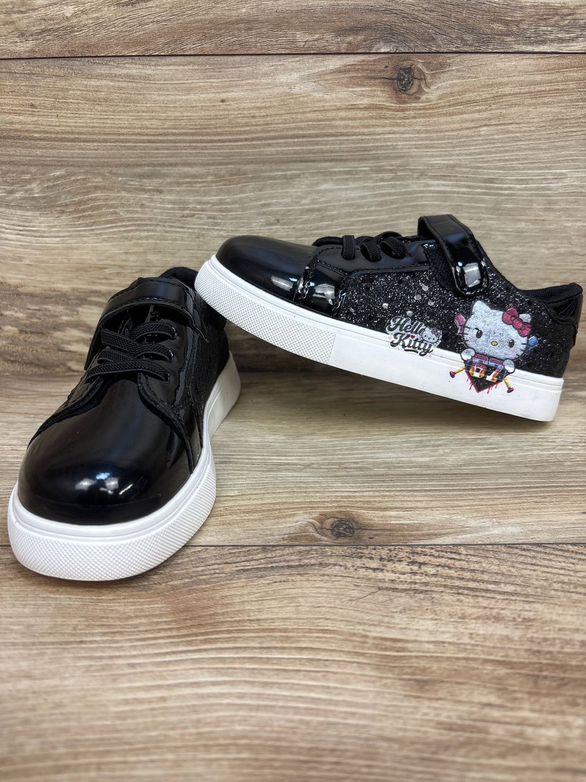 NWOT Hello Kitty Glossy Sneakers Black sz 12c