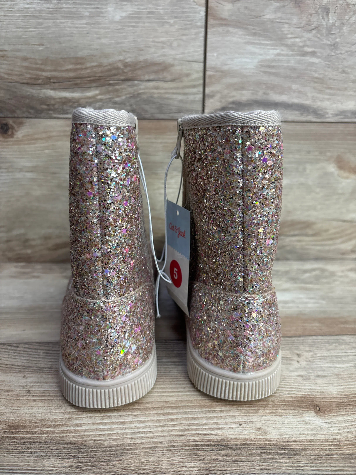 Sparkly glitter toddler boots size 5 on wood background, kids footwear resale