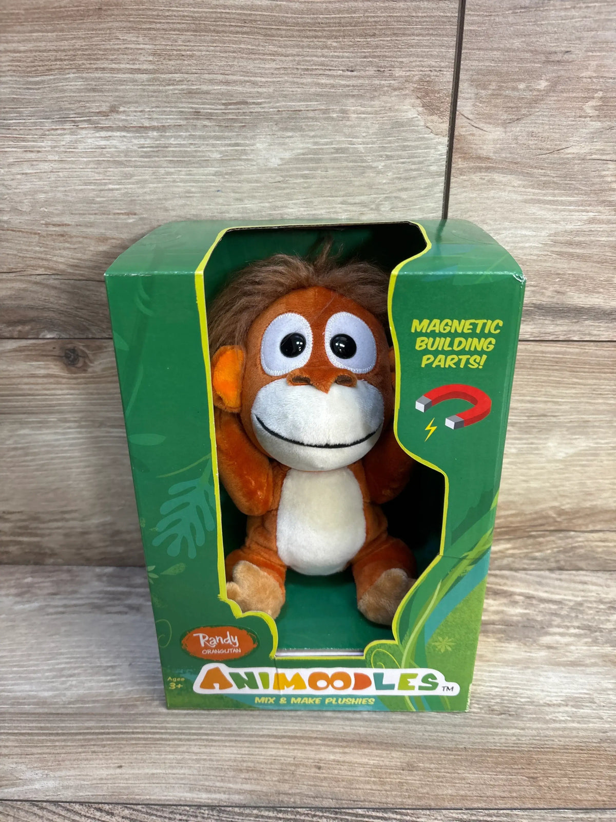 Animoodles Randy orangutan plush toy in green box with magnetic building parts for kids