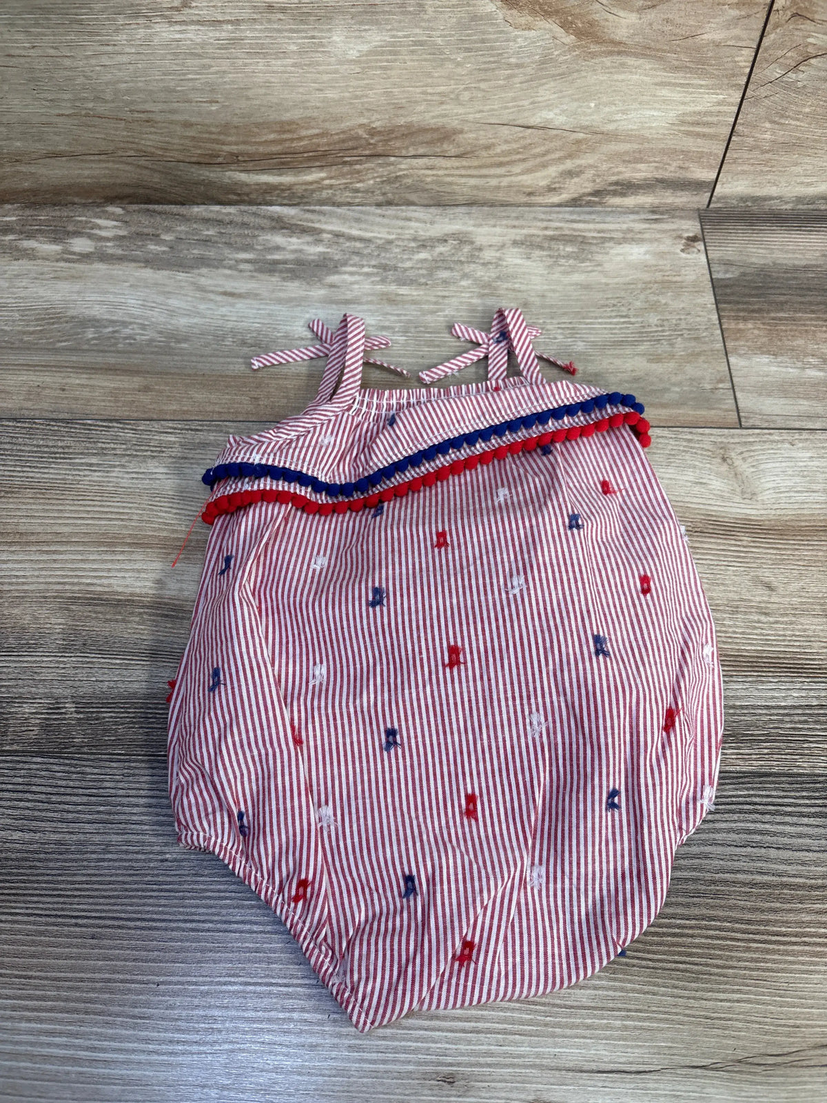 Cat & Jack red and white striped sleeveless bubble romper with pom pom trim, size 0-3m