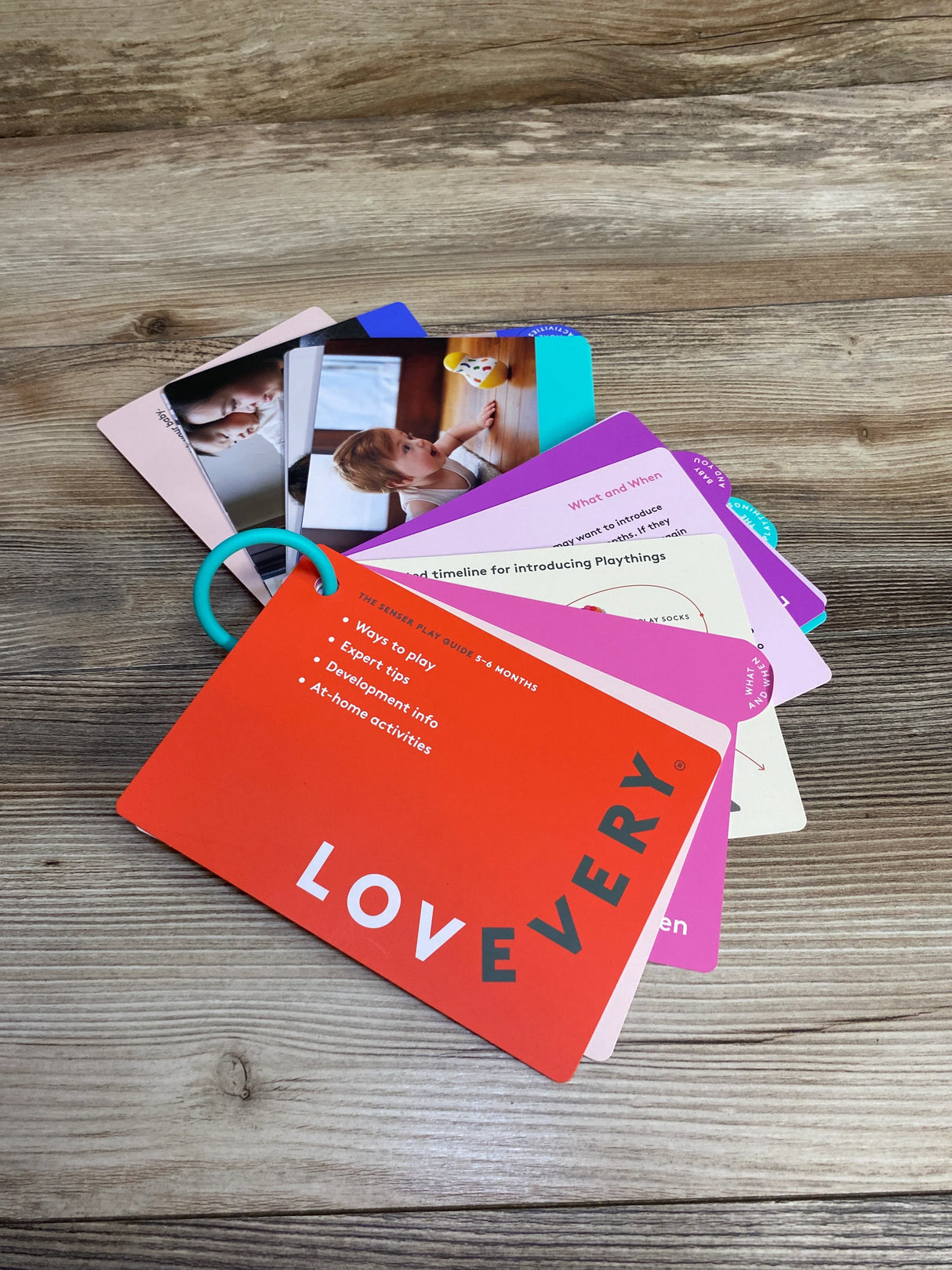 Lovevery sensory play guide cards for 5-6 months with ways to play, expert tips, and development info
