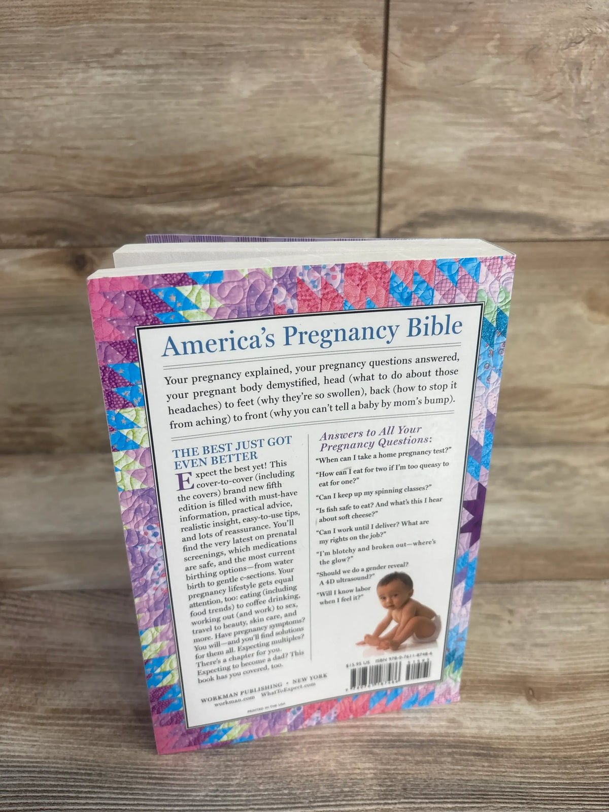 Back cover of What to Expect When You’re Expecting 5th Edition paperback book with pregnancy questions and baby image