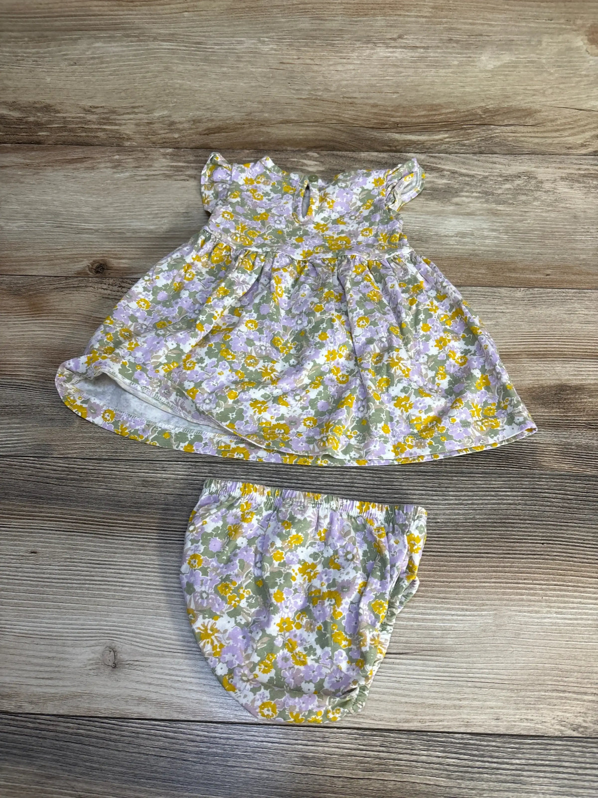Floral baby dress and bloomers set with purple yellow flowers, perfect for spring outfits
