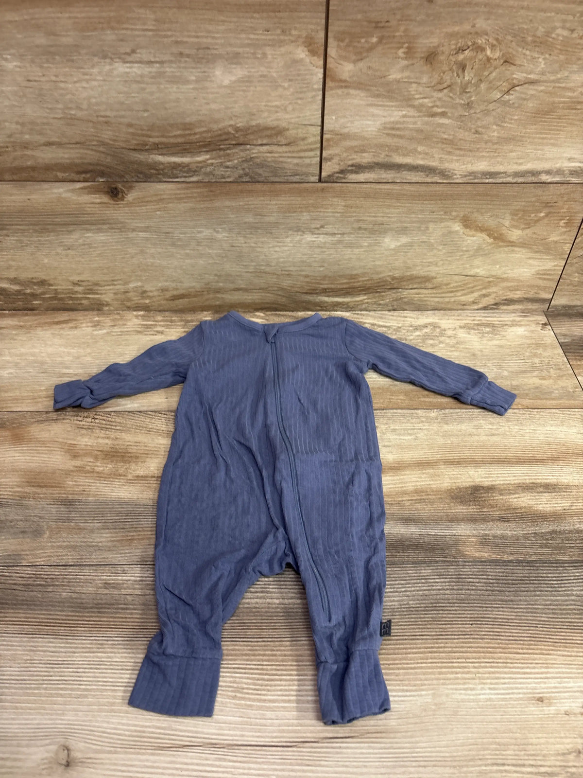 Modern Moments ribbed footless viscose baby sleeper in blue, size 3-6m, on a wooden background