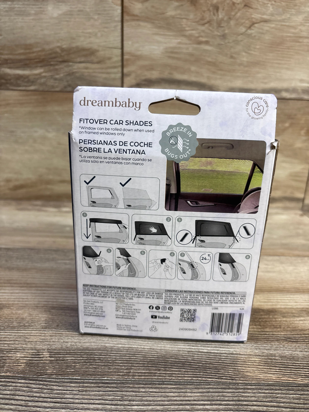 Rear view of DreamBaby 2-pack fit-over car shades packaging with installation diagrams and Breeze In Bugs Out badge on wood