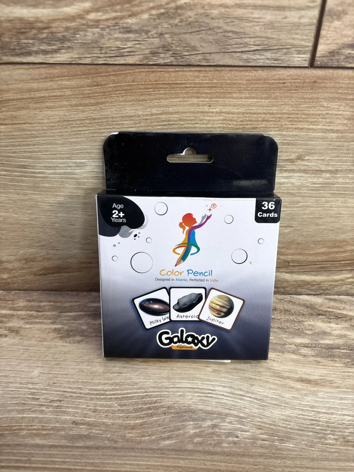 Galaxy flashcards box for kids age 2+, 36 educational space learning cards on wood background