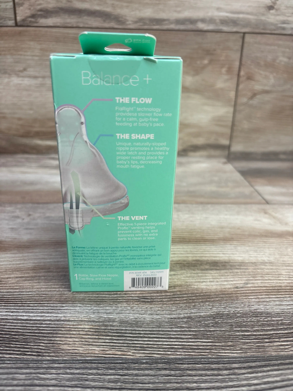 Front view of Evenflo Balance Plus 5-ounce wide-neck baby bottle package showcasing slow-flow nipple, vent, and sloped shape