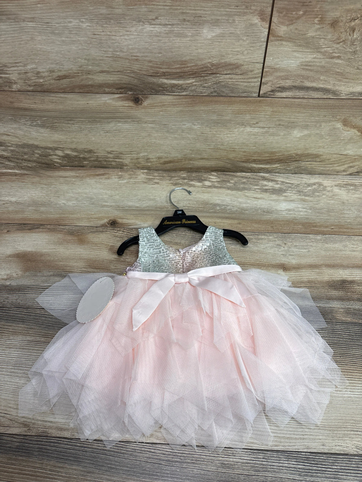 American Princess sleeveless sequin dress with pink tulle skirt and bow, size 3m