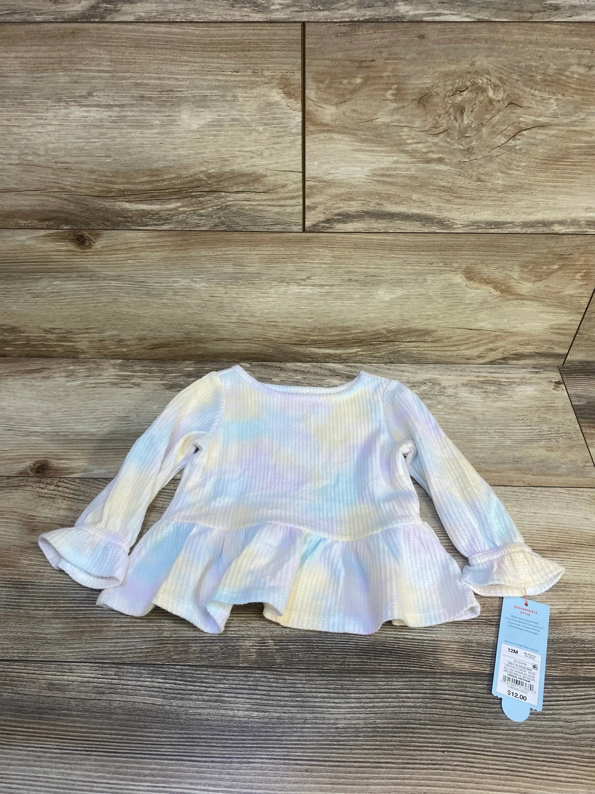 Long sleeve ruffle baby top with pastel tie-dye pattern and ribbed texture, size 12M