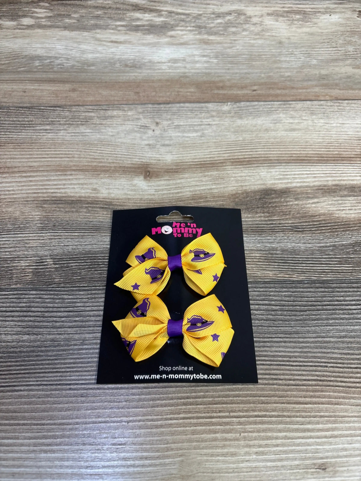 Yellow and purple witch hat hair bows for kids, Halloween-themed accessory on black card