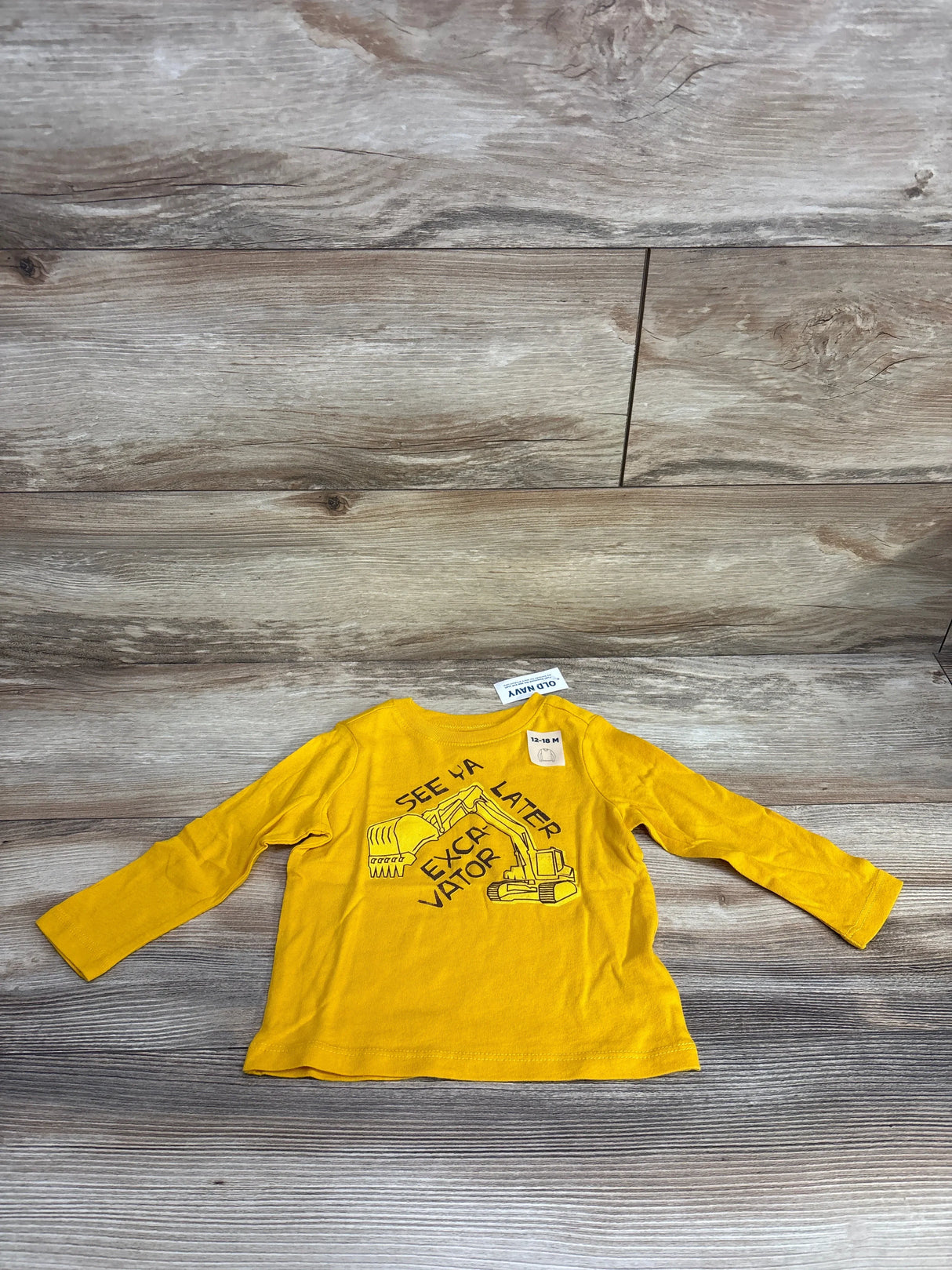 Yellow toddler long sleeve shirt with excavator graphic and 'See Ya Later Excavator' text, size 12-18M