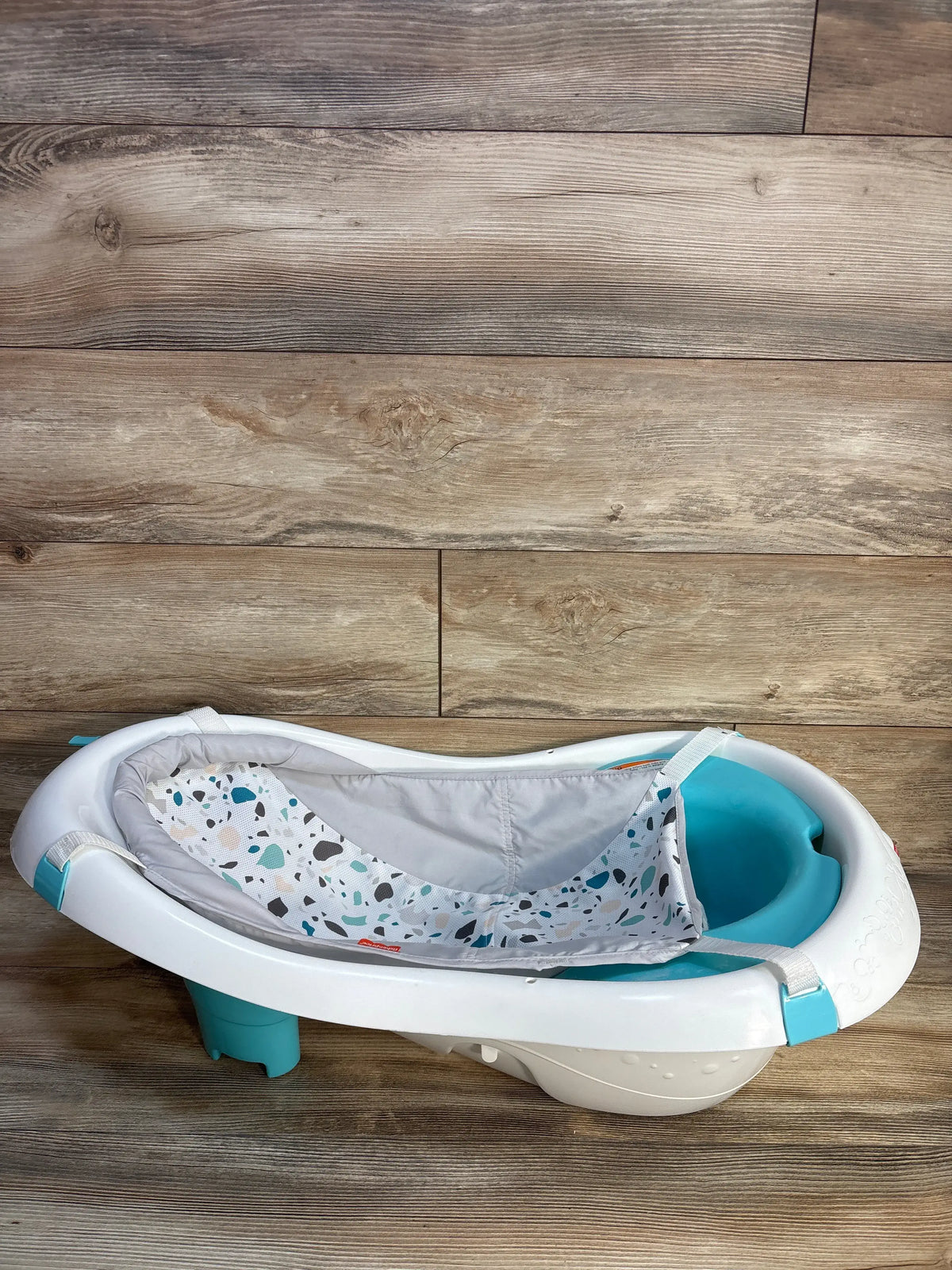 Fisher-Price 4-in-1 Sling 'n Seat Bath Tub in white and teal with patterned sling