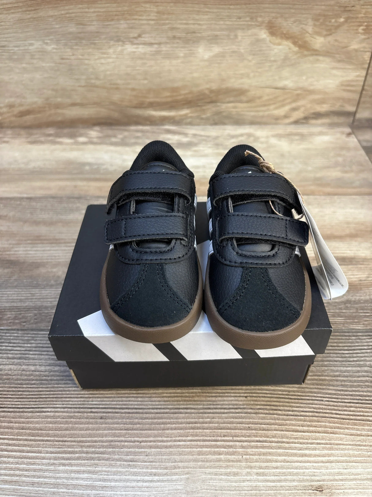 Front view of NEW Adidas VL Court 3.0 Sneakers Black sz 5c showcasing dual velcro straps and gum sole on Adidas box