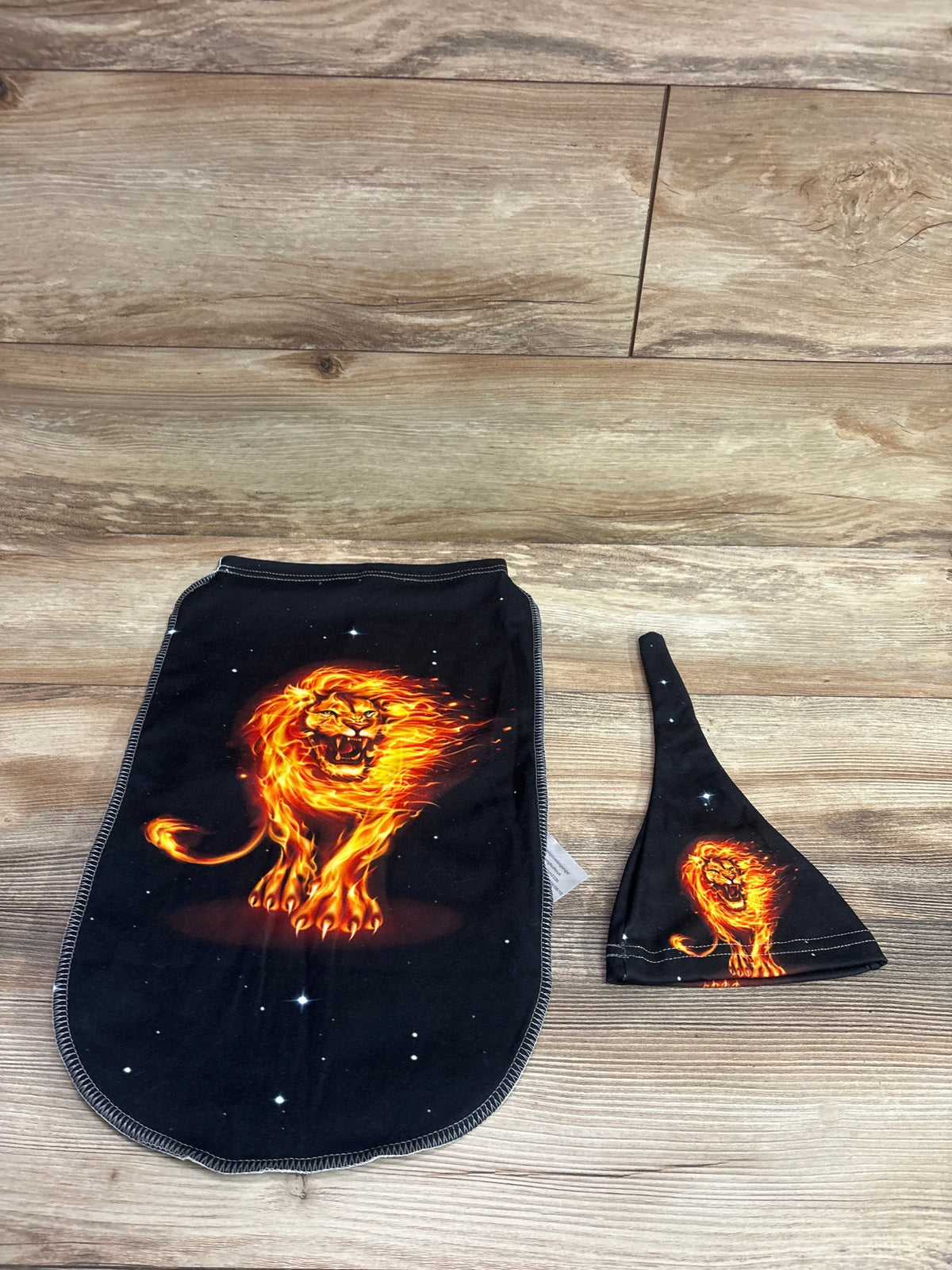 Black 2pc Me n Mommy To Be swaddle sack and hat set featuring a fiery lion print.