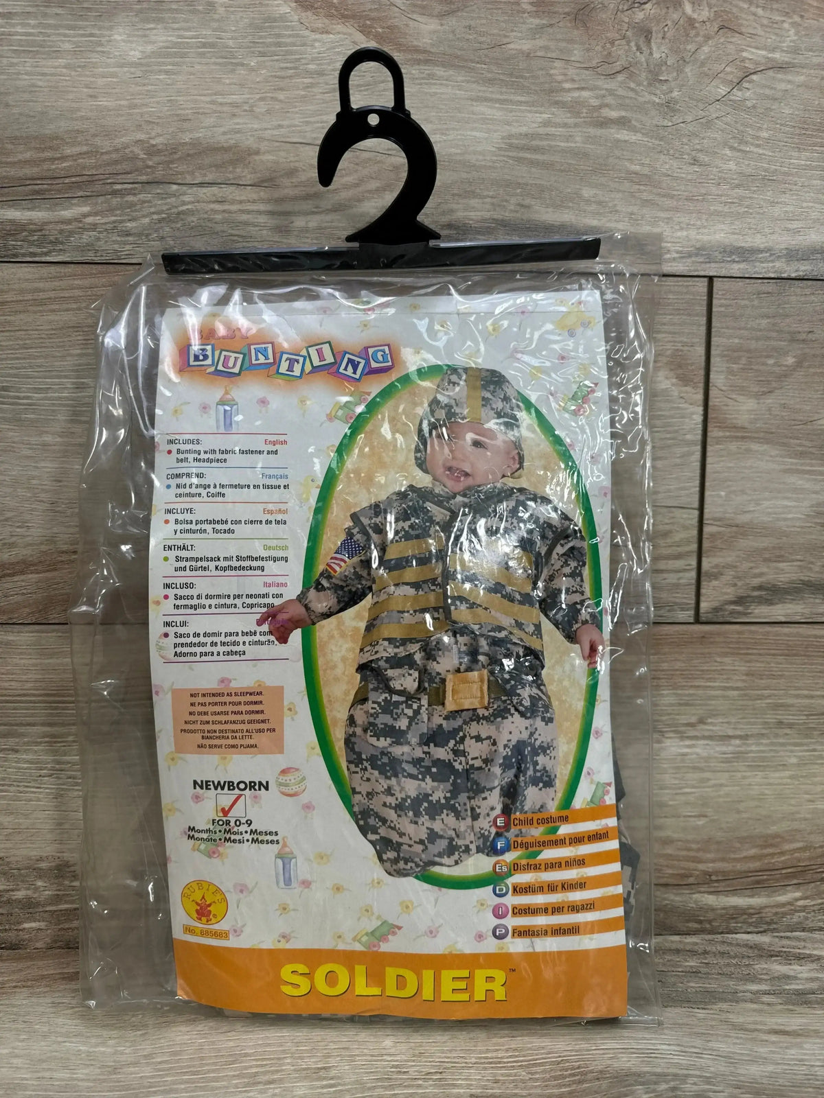Front view of Rubie’s soldier bunting costume for newborns aged 0–9 months, with camouflage print and hood