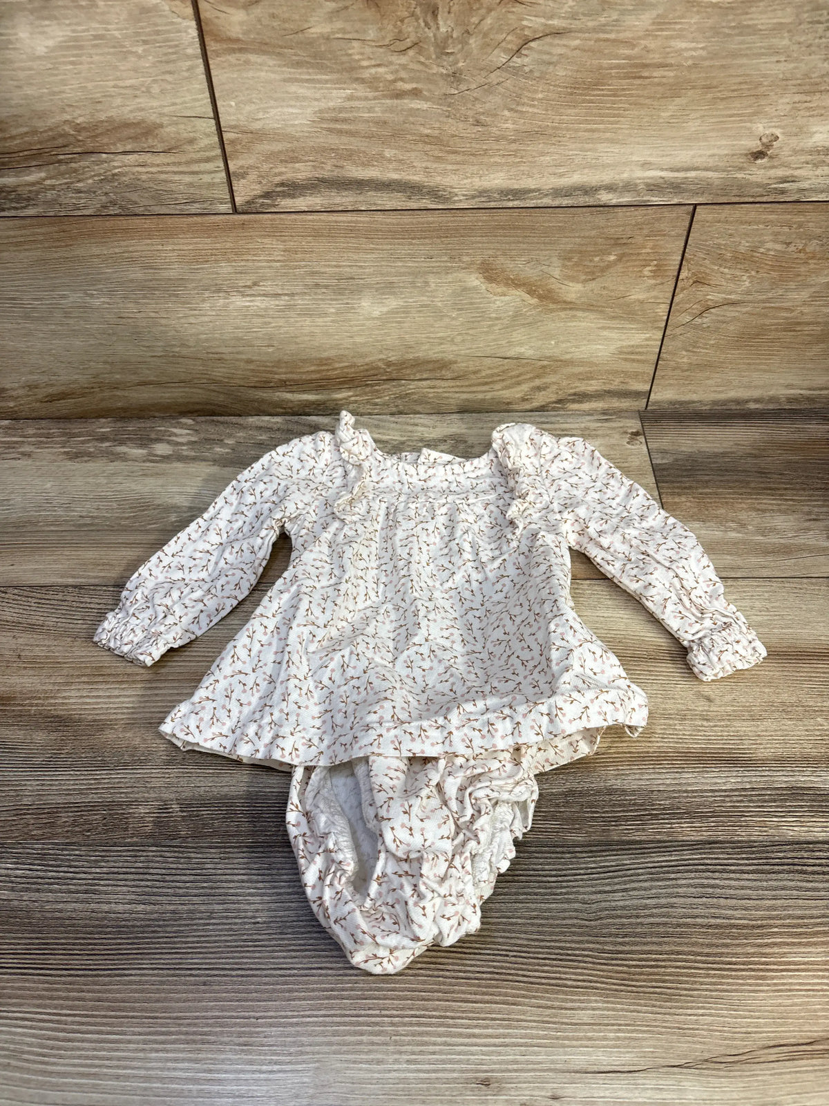 Just One You white floral 2pc dress and bloomers set for baby size 9m on wood background