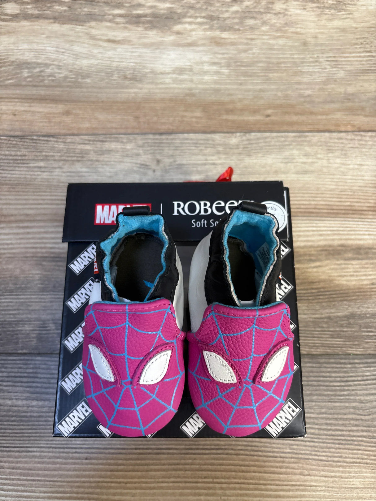 Pink Spider-Man baby shoes with blue web design, soft sole, Marvel licensed, for infants