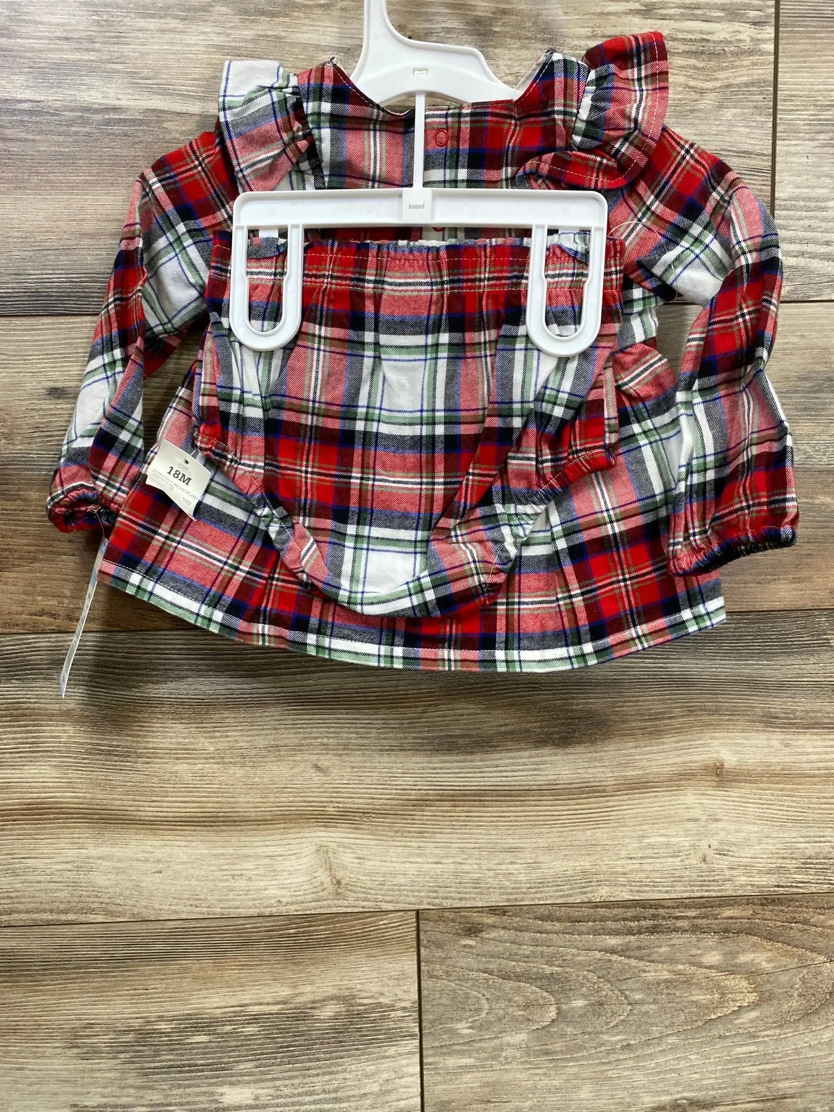 Red plaid baby dress with ruffles, 18M size, hanging on hanger