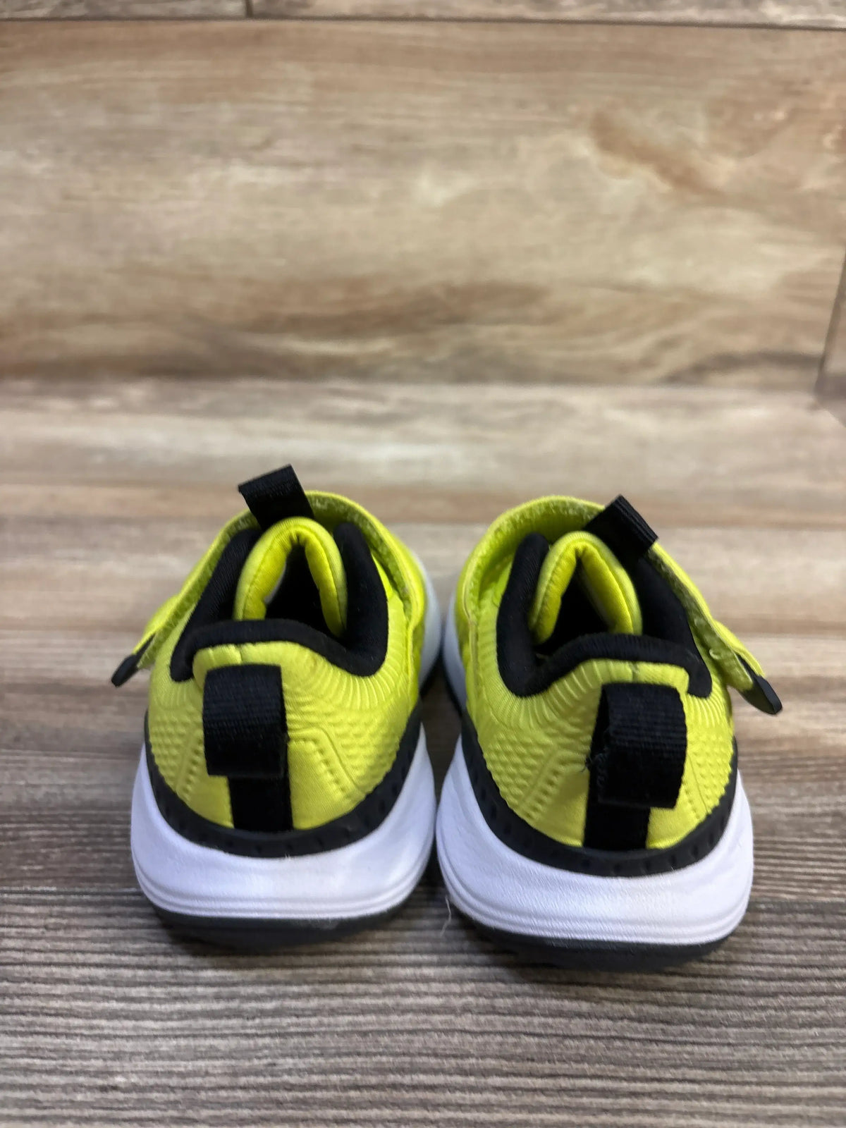 Rear view of yellow All In Motion hook and loop strap shoes for kids, size 5C