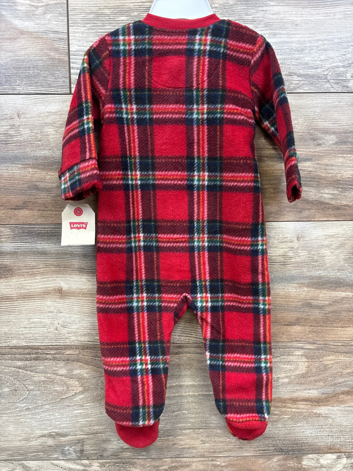 Red plaid baby footed pajamas with Levi's tag, cozy fleece material, perfect for infants and toddlers.