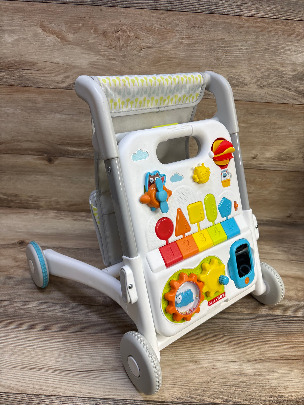 Skip Hop 4-in-1 Sit to Stand Convertible Walker