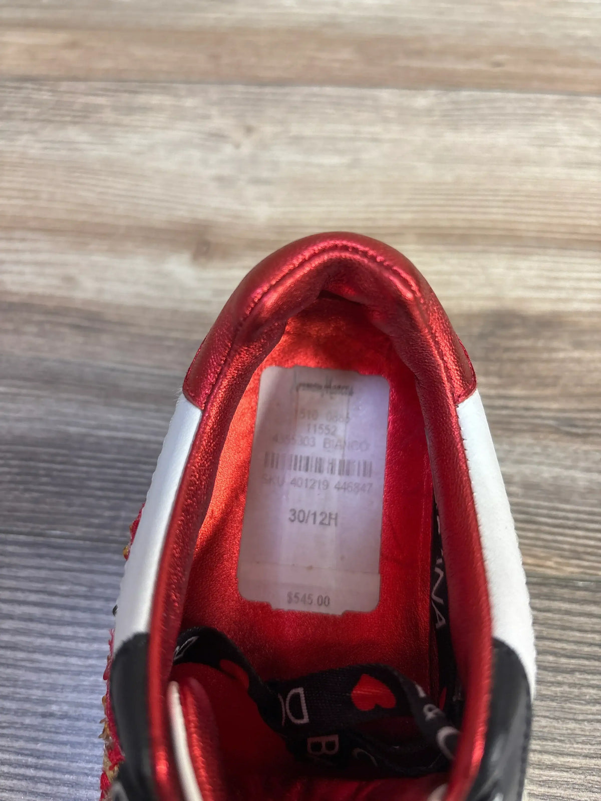 Top view of Dolce & Gabbana Portofino DG Amore calfskin sneaker showing red lining and 30/12H size marking