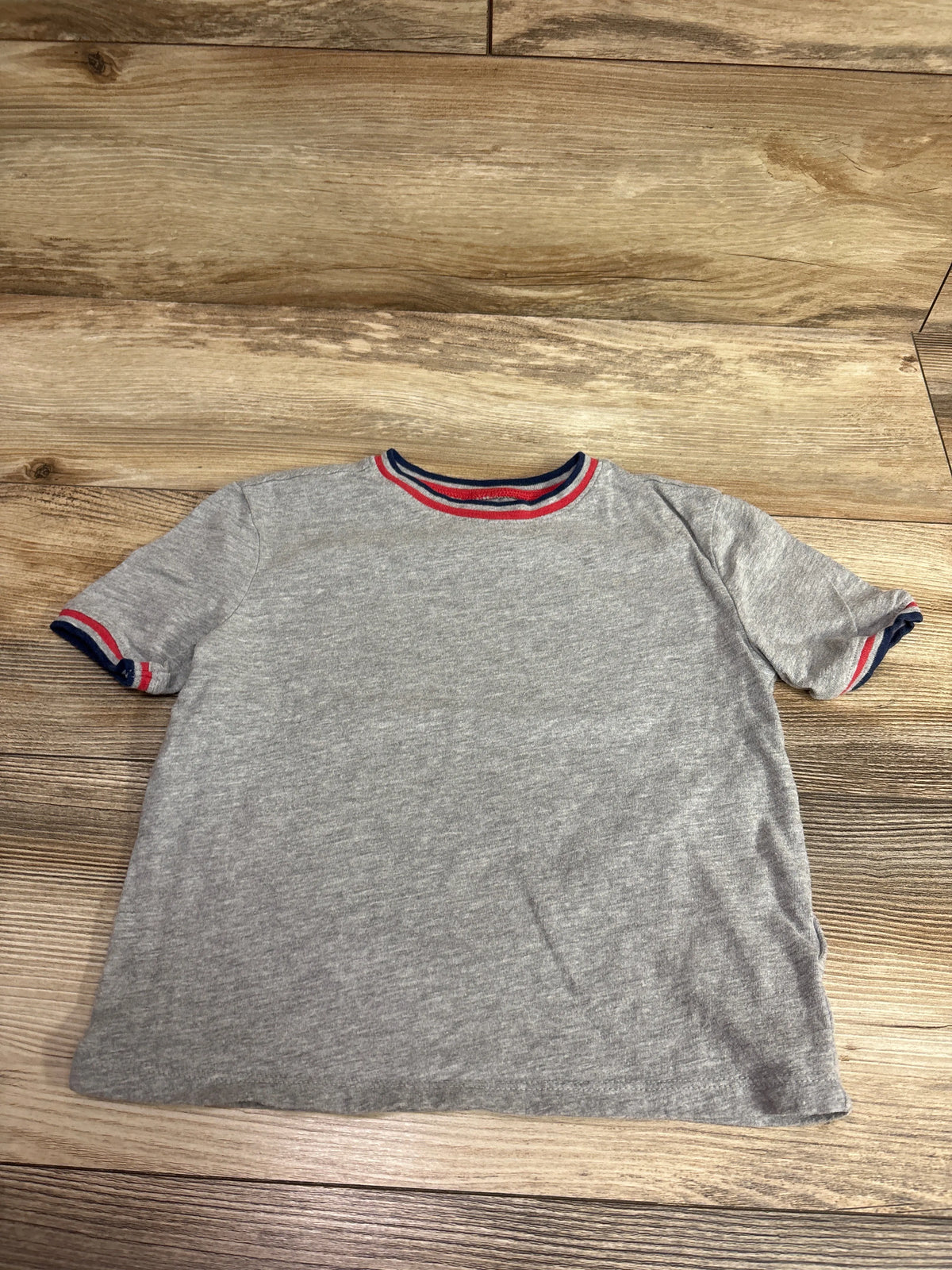 Grey Old Navy toddler t-shirt with red and blue striped trim on the collar and sleeves.
