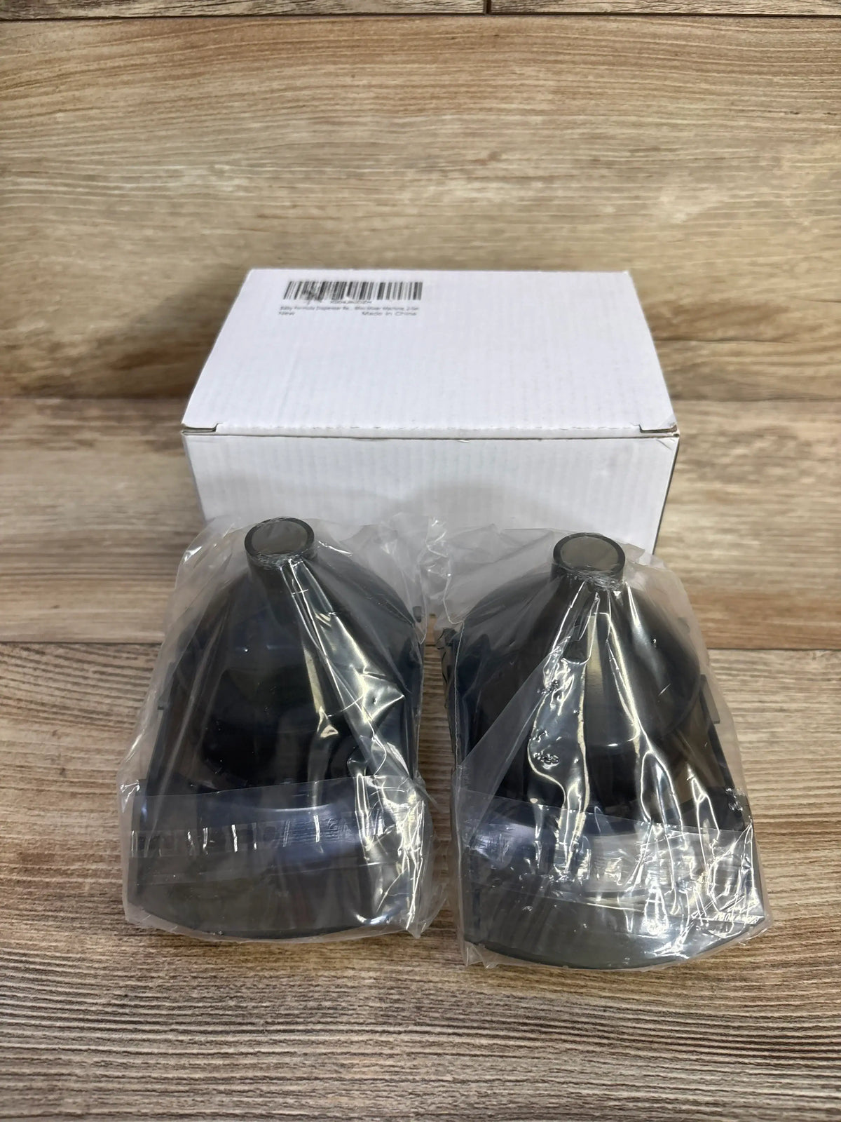 Front view of two black Mixzeny formula dispenser replacement funnels for Baby Brezza Formula Pro Mini