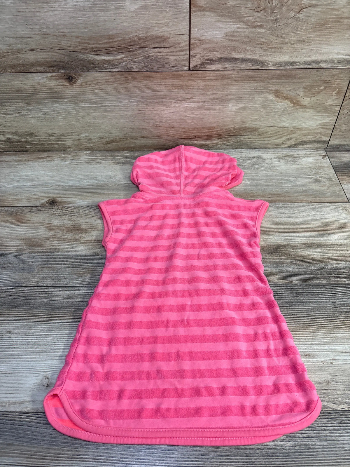 Back view of Cat and Jack terry cloth swim cover up size 2T showing hooded sleeveless pink striped design on wood floor