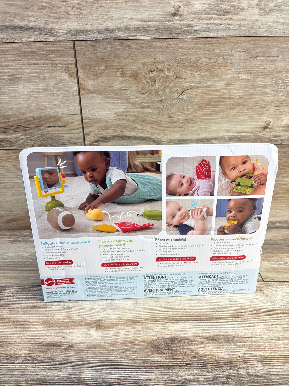 Front of Fisher-Price Tiny Tailgater box showing babies with foam football toys and headline ‘Tailgates and touchdowns!’