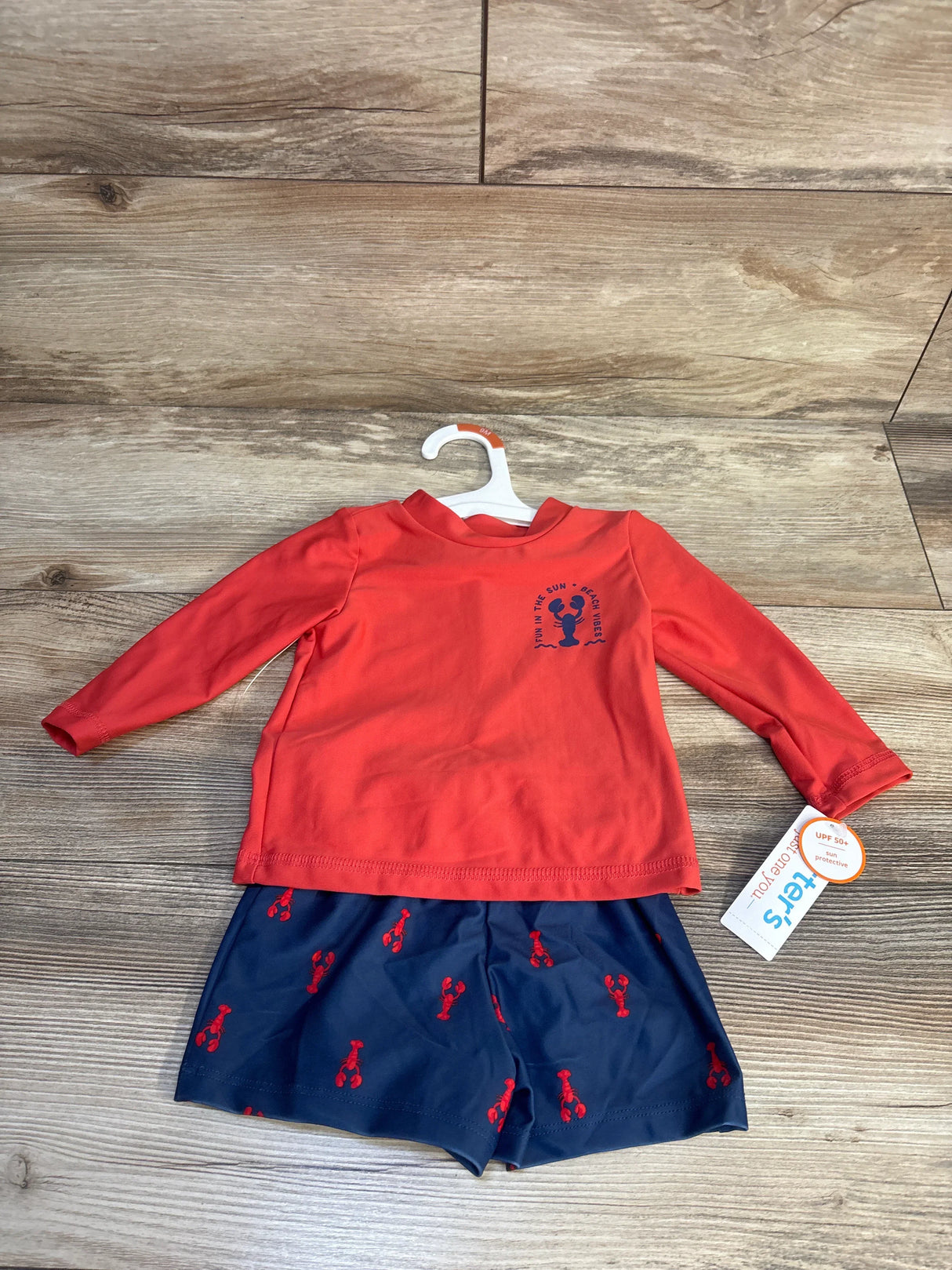 Kids red rash guard set with long sleeves and navy shorts, lobster print, UPF 50+ swimwear