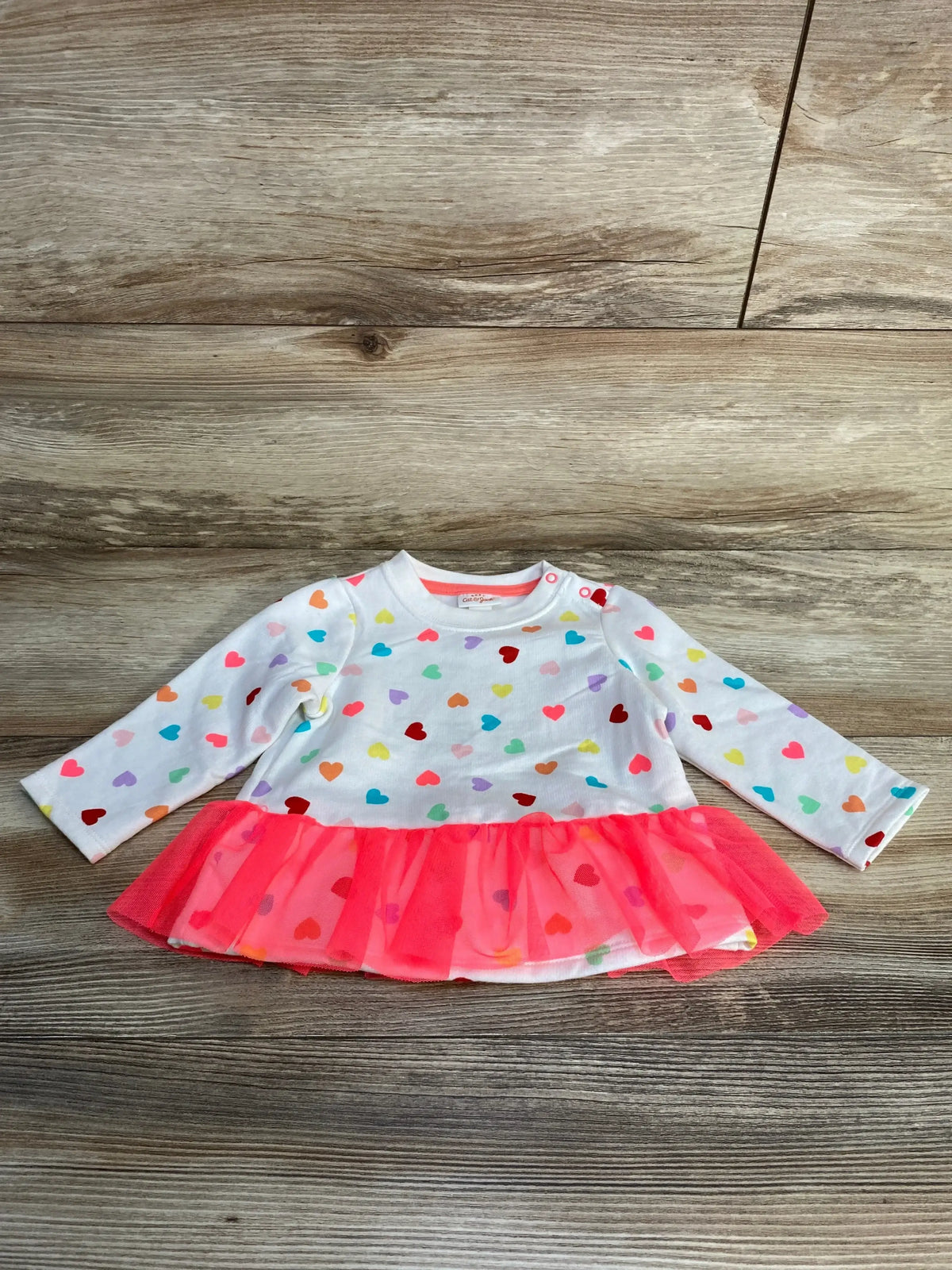 Front of Cat and Jack baby sweatshirt showing red heart print on white fabric, size 6–9 months