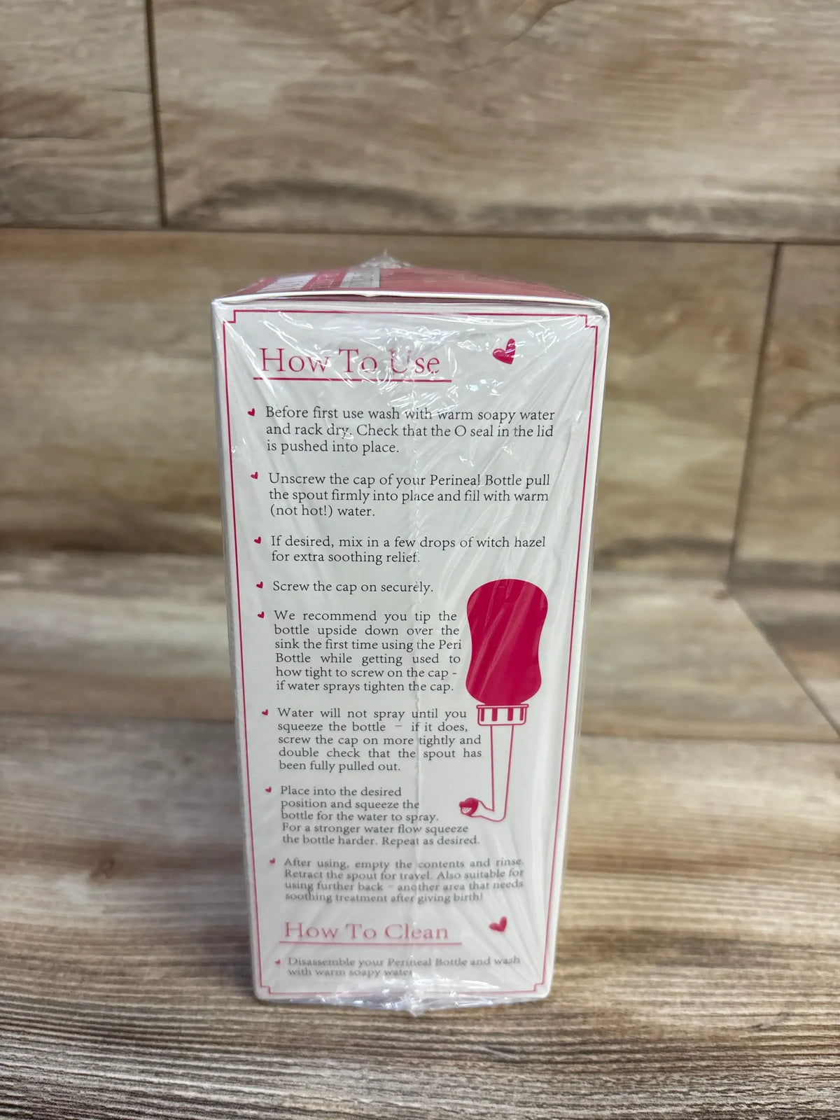 Back of the Ninja Mama Postpartum Perineal Bottle packaging showing usage and cleaning instructions.
